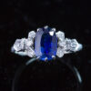 Vintage natural blue sapphire and diamond engagement ring in 18 carat white gold and platinum