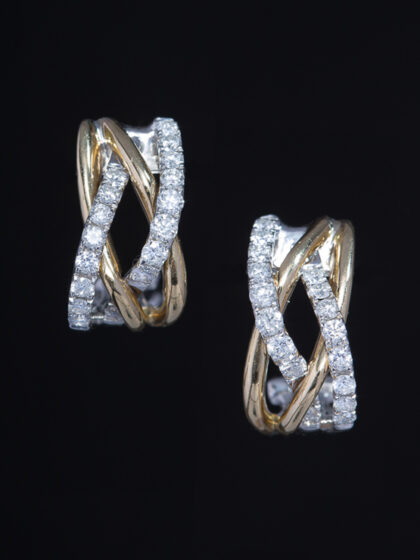 Vintage pair of diamond hoop earrings set in yellow and white gold with great everyday wearability